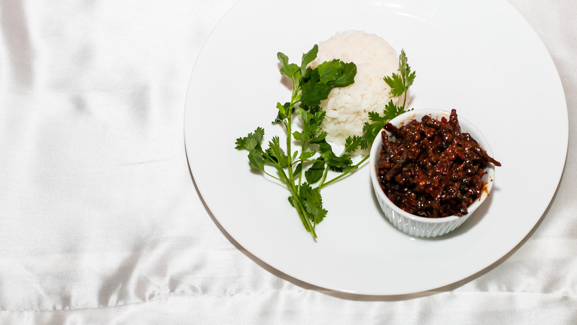 Close-up of plated dessert with micro herbs